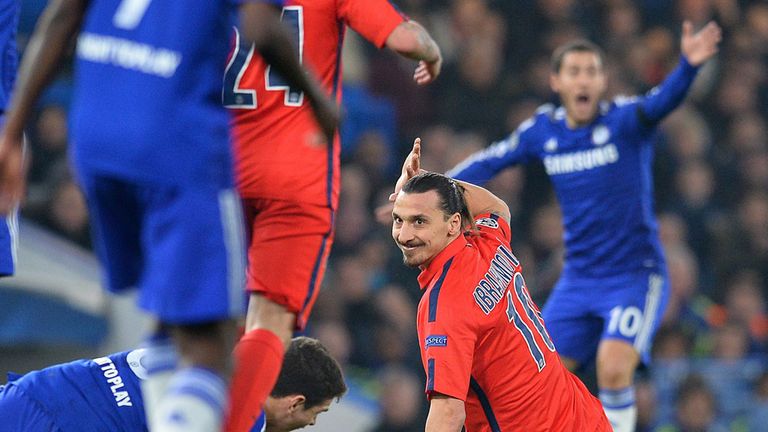 Zlatan Ibrahimovic gestures to the referee after a clash with Oscar