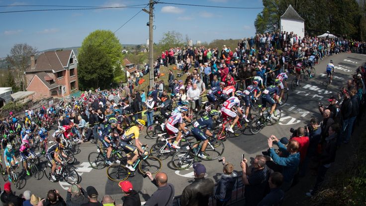 The pack of cyclists in action on the final climb 'Mur de Huy' during the 79th edition of the La Fleche Wallonne