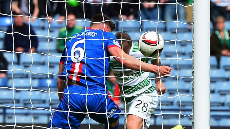 GLASGOW, SCOTLAND - APRIL 19:  Josh Meekings of Caledonian Thistle apparently handles the ball on the goal line from Leigh Griffiths of Celtic during the W