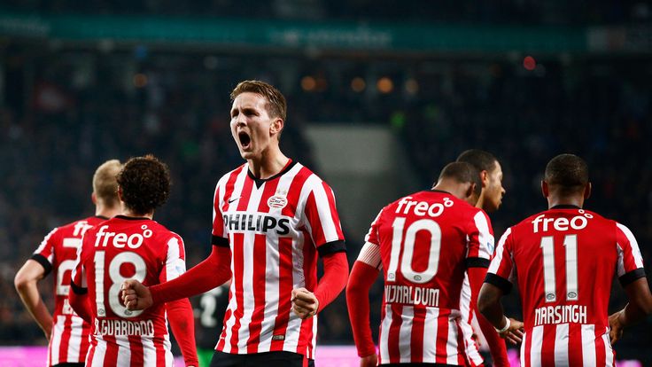 EINDHOVEN, NETHERLANDS - DECEMBER 17:  Luuk de Jong of PSV Eindhoven celebrates scoring his teams first goal of the game with team mates during the 