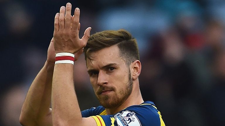 BURNLEY, ENGLAND - APRIL 11:  Aaron Ramsey of Arsenal applauds the fans after the Barclays Premier League match between Burnley and Arsenal at Turf Moor on