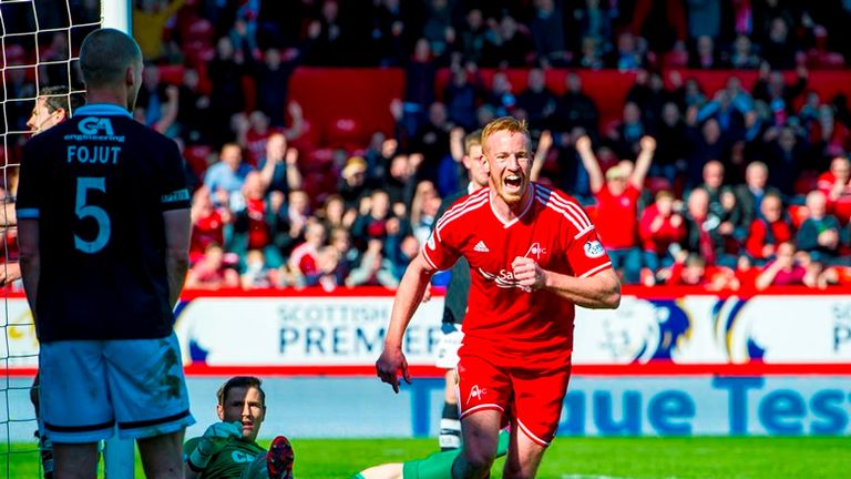 Aberdeen's Adam Rooney celebrates after putting his side 1-0 up.