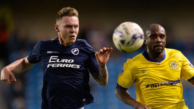 Aiden O'Brien and Emmerson Boyce chase the ball