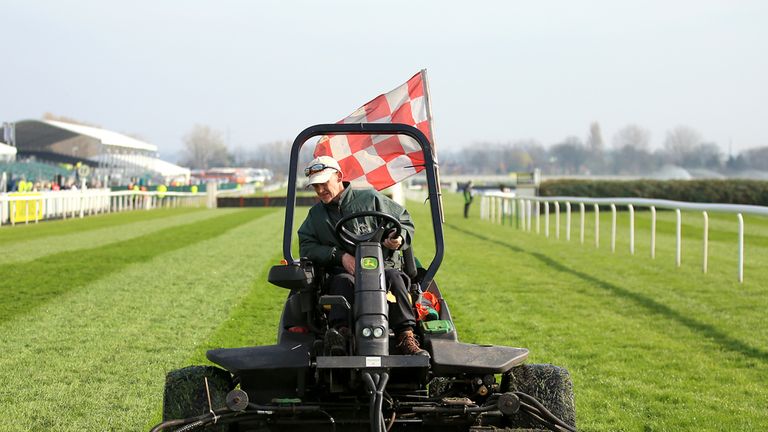 The grass is cut ahead of the day's racing on Ladies Day of the Crabbie's Grand National Festival