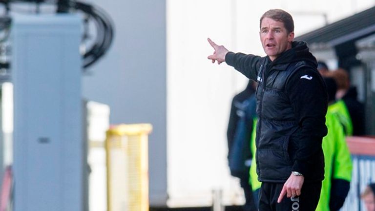 Partick manager Alan Archibald instructs his team from the sidelines as they beat Motherwell