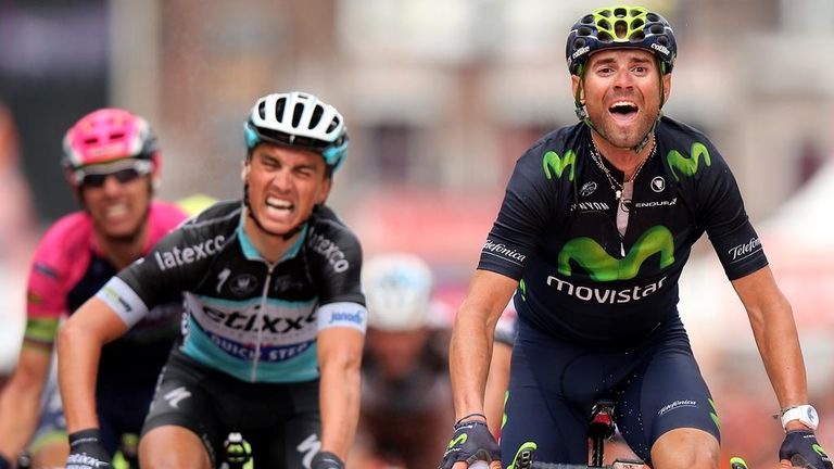 Alejandro Valverde celebrates his victory as he crosses the finish line during the 101st Liege-Bastogne-Liege ahead of Julian Alaphilippe