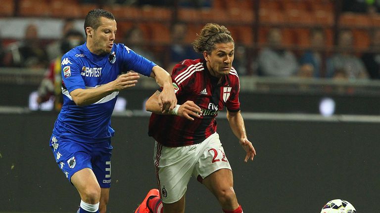 Alessio Cerci gets away from Djamel Mesbah 