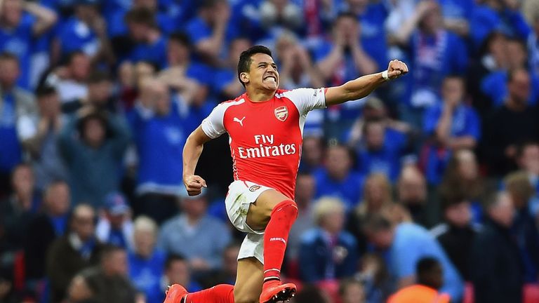 Alexis Sanchez celebrates his winning goal in extra-time during the FA Cup semi-final against Reading at Wembley Stadium 