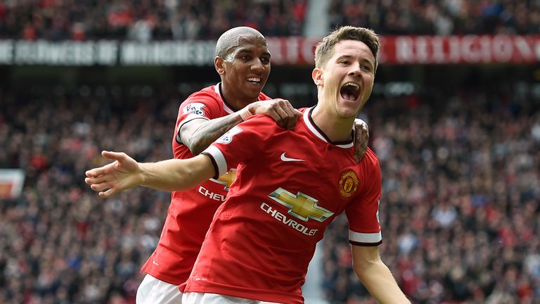 Ander Herrera celebrates with Ashley Young 