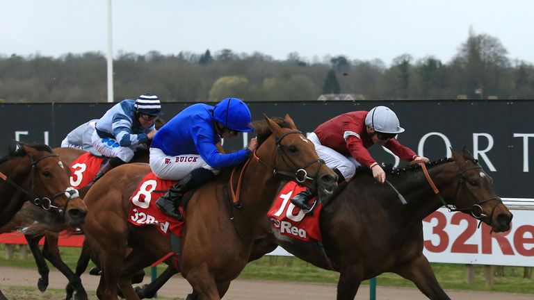 Mymatechris, (right) ridden by David Probert comes home to win The 32Red All-Weather Marathon Championships Conditions Stakes from second placed Anglophile