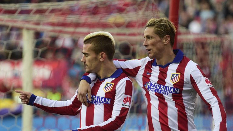 Antoine Griezmann celebrates with Fernando Torres 