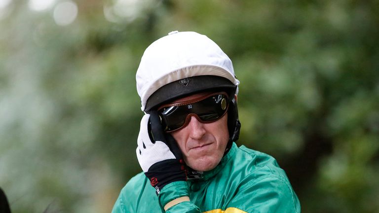ESHER, ENGLAND - APRIL 25: Tony McCoy pulls his goggles down at Sandown racecourse on April 25, 2015 in Esher, England. (Photo by Alan Crowhurst/Getty Imag