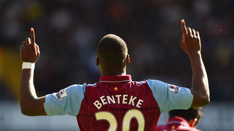 Christian Benteke of Aston Villa celebrates scoring the opening goal against Tottenham