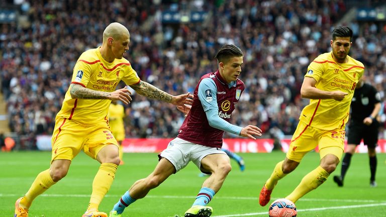 Martin Skrtel and Emre Can marshall Jack Grealish during the FA Cup Semi Final between Aston Villa and Liverpool at Wembley Stadium on April 19, 2015