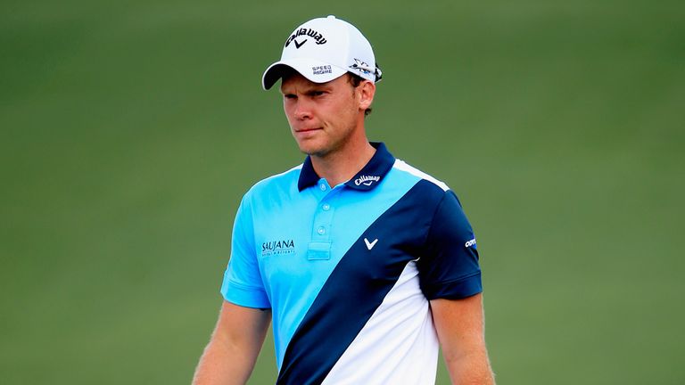 Danny Willett of England walks across the second green during the second round of the 2015 Masters Tournament at Augusta National 