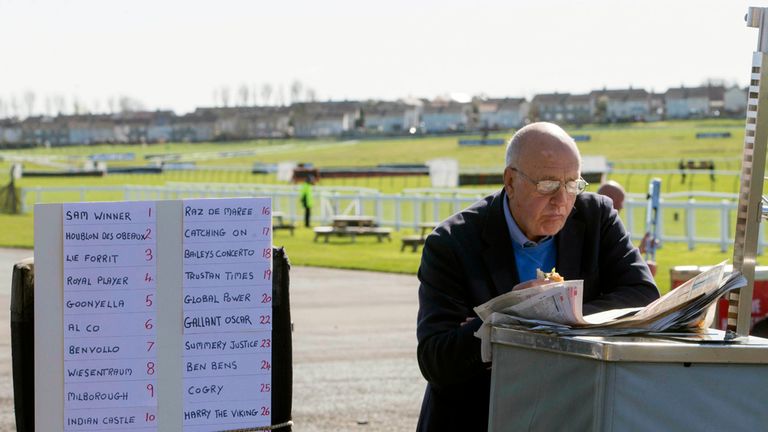 A bookmaker takes a break before the 2015 Coral Scottish Grand National Festival at Ayr
