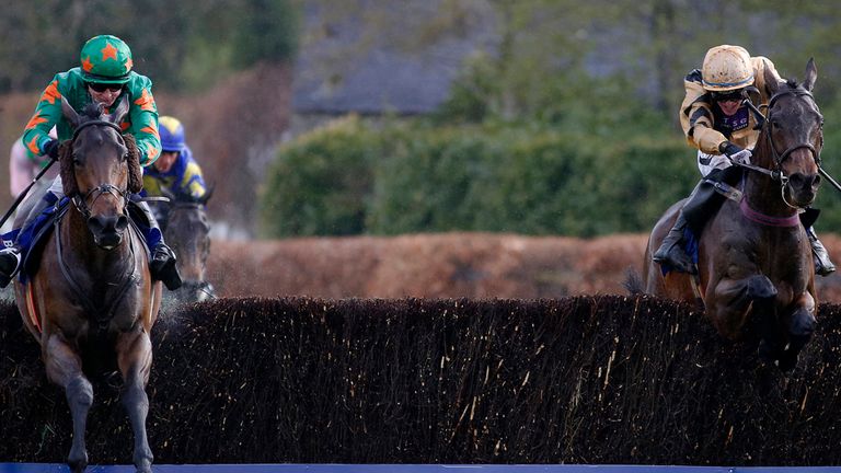 Felix Yonger (R) clears the last to win The Boylesports Champion Steeplechase from Baily Green