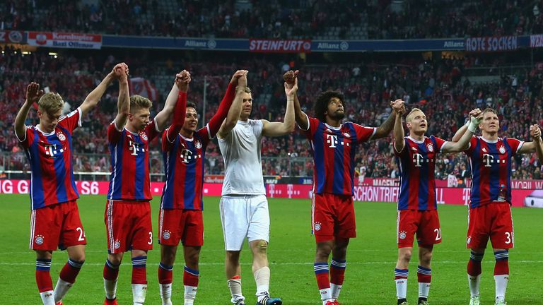 Bayern Munich players celebrate at the full-time whistle