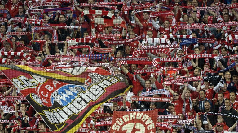 Bayern Munich fans cheer for their team during the UEFA Champions League second-leg quarter-final football match Bayern Munich v FC Porto