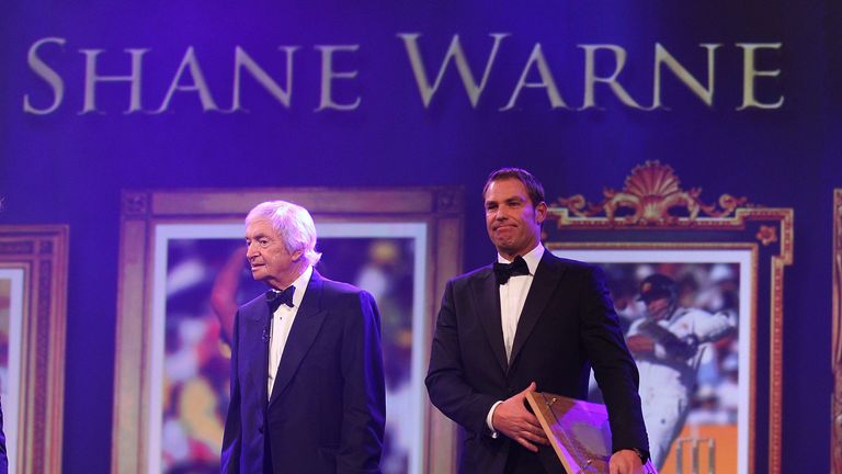 Shane Warne stands with Richie Benaud after being inducted into the Australian Cricket Hall of Fame during the 2012 Al
