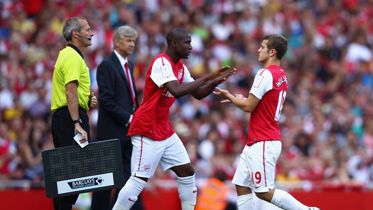 Benik Afobe of Arsenal comes on for team mate Jack Wilshere who is substituted during the Emirates Cup match between Arsenal an