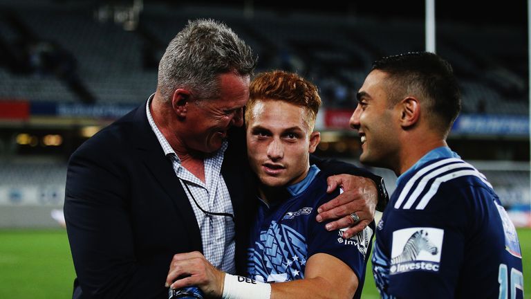 Coach John Kirwan congratulates Ihaia West after his match-winning kick