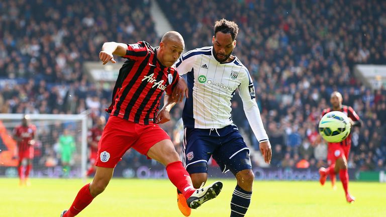 Bobby Zamora scores a spectacular third goal for QPR with the outside of his left boot, under pressure from West Brom's Joleon Lescott