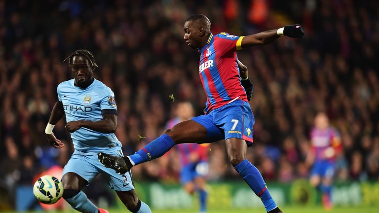 Yannick Bolasie of Crystal Palace is closed down by Bacary Sagna of Manchester City