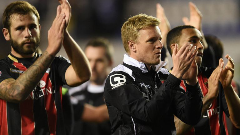 READING, ENGLAND - APRIL 14:  Eddie Howe manager of Bournemouth and players applaud the travelling fans after victory in the Sky Bet Championship match