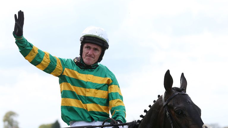 Tony McCoy waves to the crowd after his last race, the bet365 Handicap Hurdle during the bet365 Jump Finale at Sandown Racecourse, Surrey. PRESS ASSOCIATIO