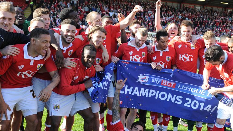 Bristol City's players celebrate winning the league during the Sky Bet League One match at Ashton Gate, Bristol.