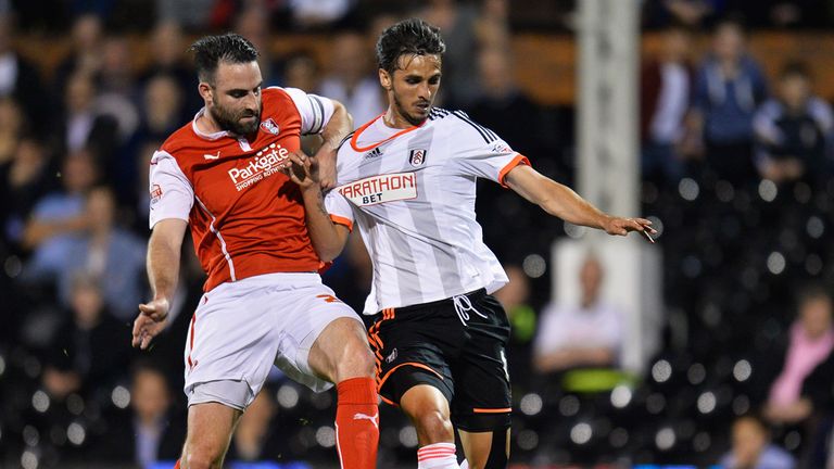 Bryan Ruiz battles with Craig Morgan 