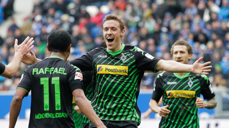  Max Kruse congratulates Raffael of Borussia Monchengladbach after he scored the third goal during the Bundesliga match against Hoffenheim 