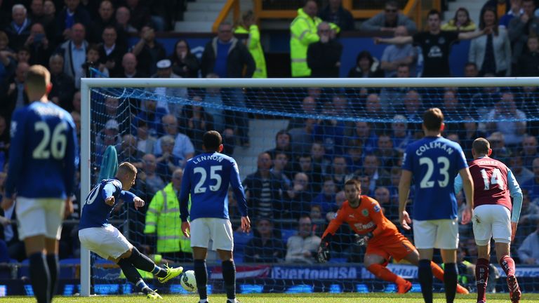 Burnley's Tom Heaton saves a penalty taken by Everton's Ross Barkley