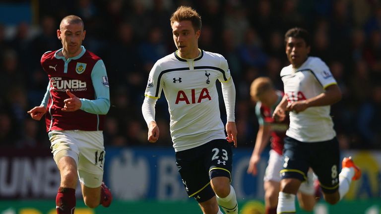 Christian Eriksen of Spurs breaks clear of  David Jones of Burnley