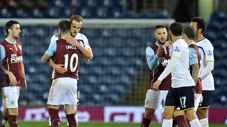 Tottenham Hotspur  striker Harry Kane and Burnley striker Danny Ings embrance after the English FA Cup third round match at Turf Moor on January 5, 2015.