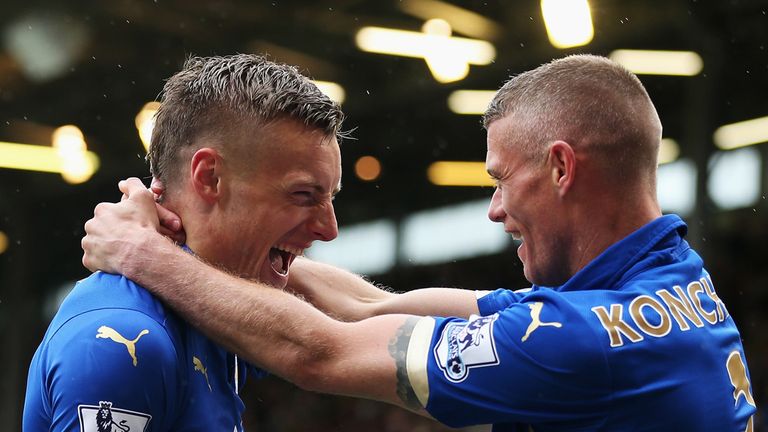 Jamie Vardy of Leicester City (L) celebrates scoring their first goal with Paul Konchesky of Leicester City during the Barcla