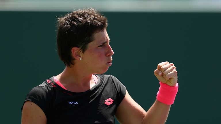 Carla Suarez Navarro of Spain celebrates match point against Andrea Petkovic of Germany 