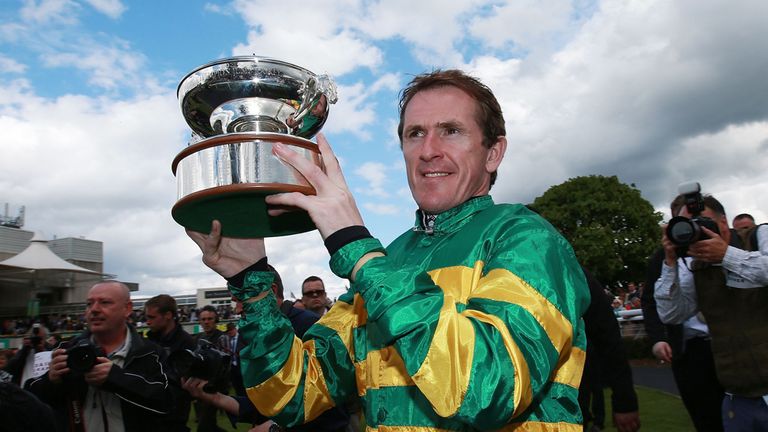 Tony McCoy parades the Champion Jockey Trophy