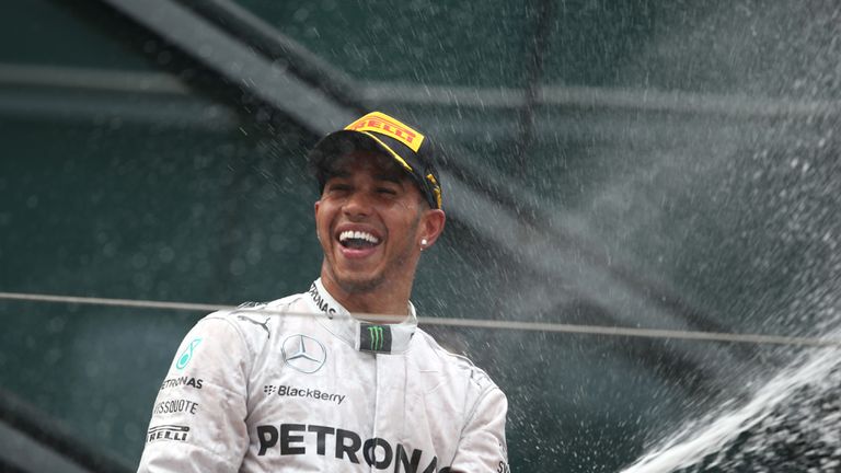 Lewis Hamilton celebrates winning the 2014 Chinese GP