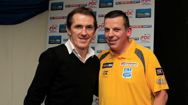 AP McCoy with Dave Chisnall at this year's World Darts Championship