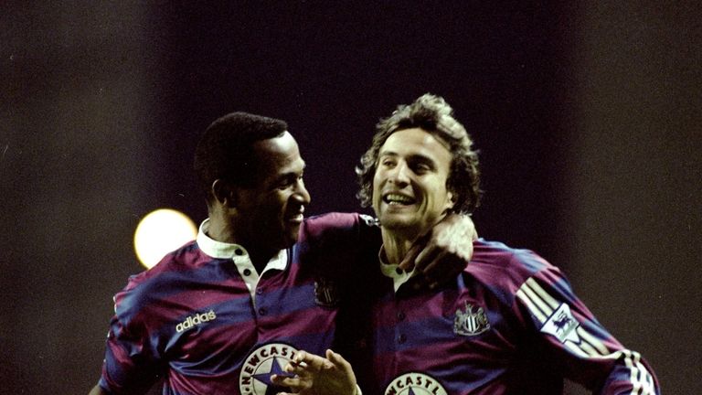 Les Ferdinand and David Ginola of Newcastle United celebrate Ginola's goal during an FA Carling Premiership match against Tottenham Hotspur in October 1995