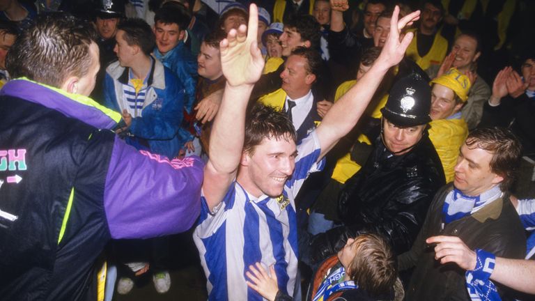 Sheffield Wednesday player David Hirst celebrates with fans after beating Chelsea in the Rumbelows League Cup semi final second leg at Hillsbrough 