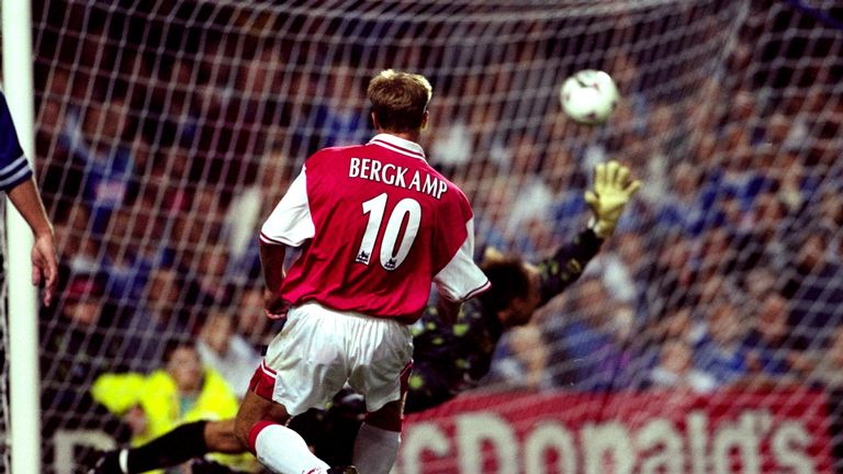 Dennis Bergkamp of Arsenal beats Kasey Keller in the Leicester City goal to complete his hat-trick in August 1997