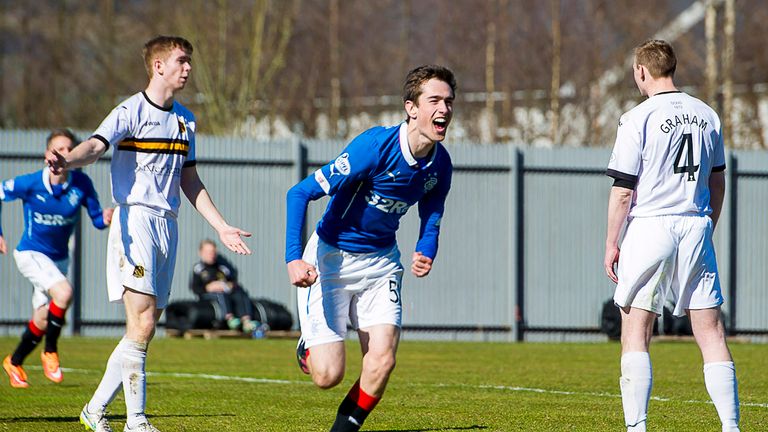 Rangers Ryan Hardie (centre) wheels away to celebrate his goal against Dumbarton.