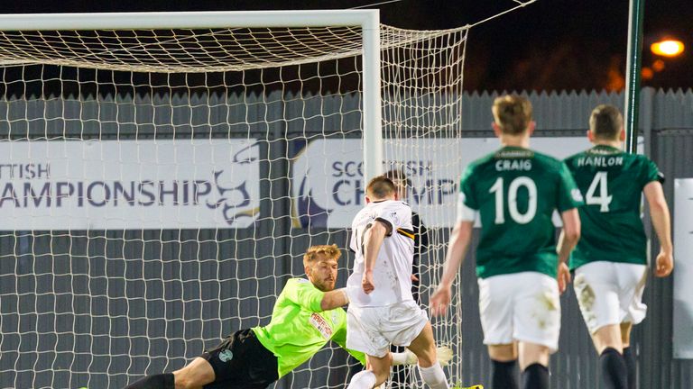 Dumbarton's Mitch Megginson scores his side's equaliser 