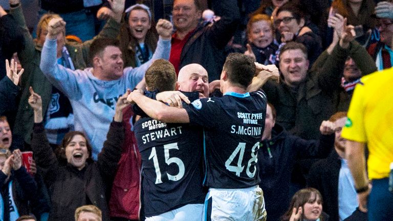 Dundee's Mark Stewart celebrates his goal with the fans