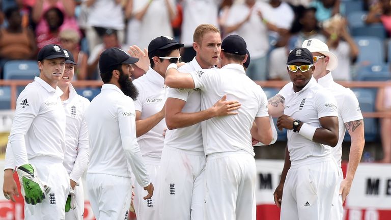 England's cricketer Stuart Broad (C) celebrates  at the Grenada National Stadium in Saint George's on April 21, 2015.