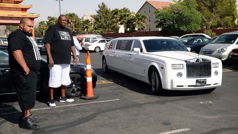Mayweather arrives at his training gym in a Rolls-Royce