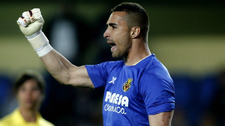 Villarreal's goalkeeper Sergio Asenjo celebrates after stopping a penalty